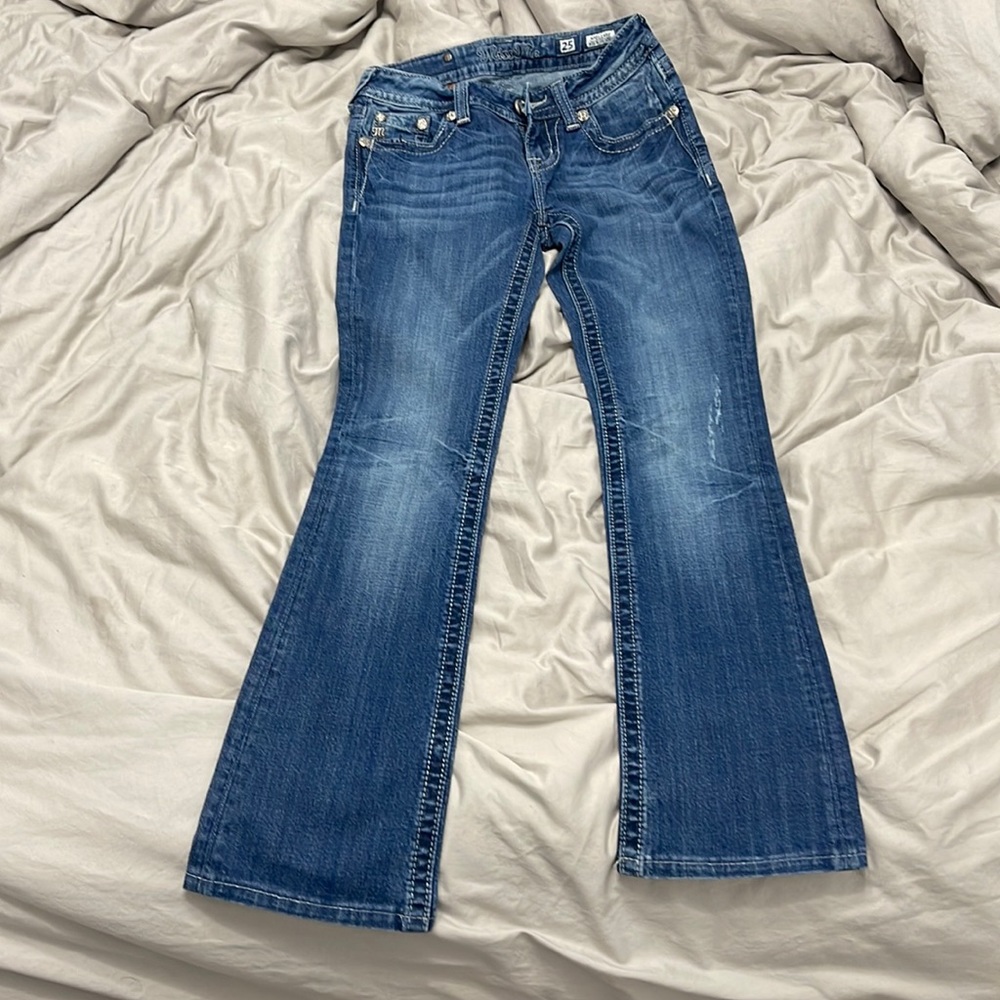 Mid rise boot cut miss me jeans